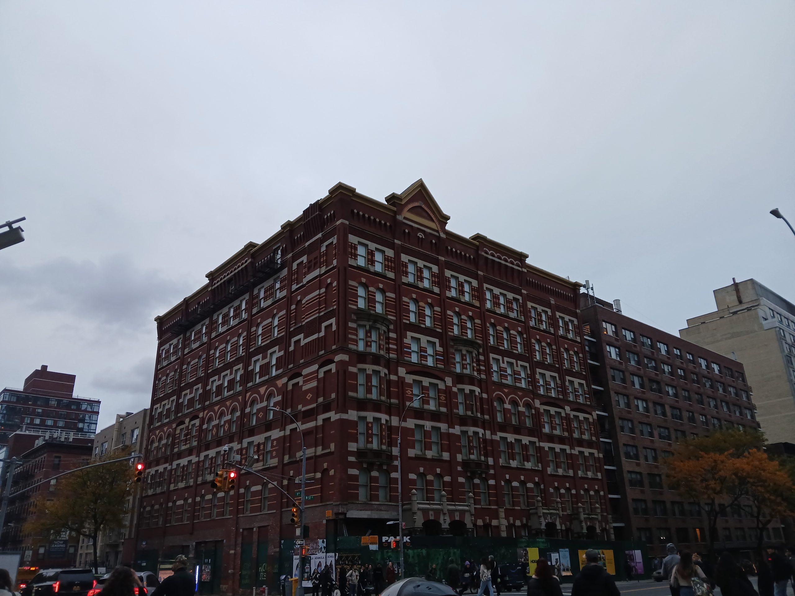 Red-brick apartment buildings at a Hell's Kitchen intersection