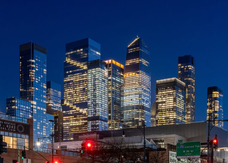 The Hudson Yards towers lit at night, March 2025