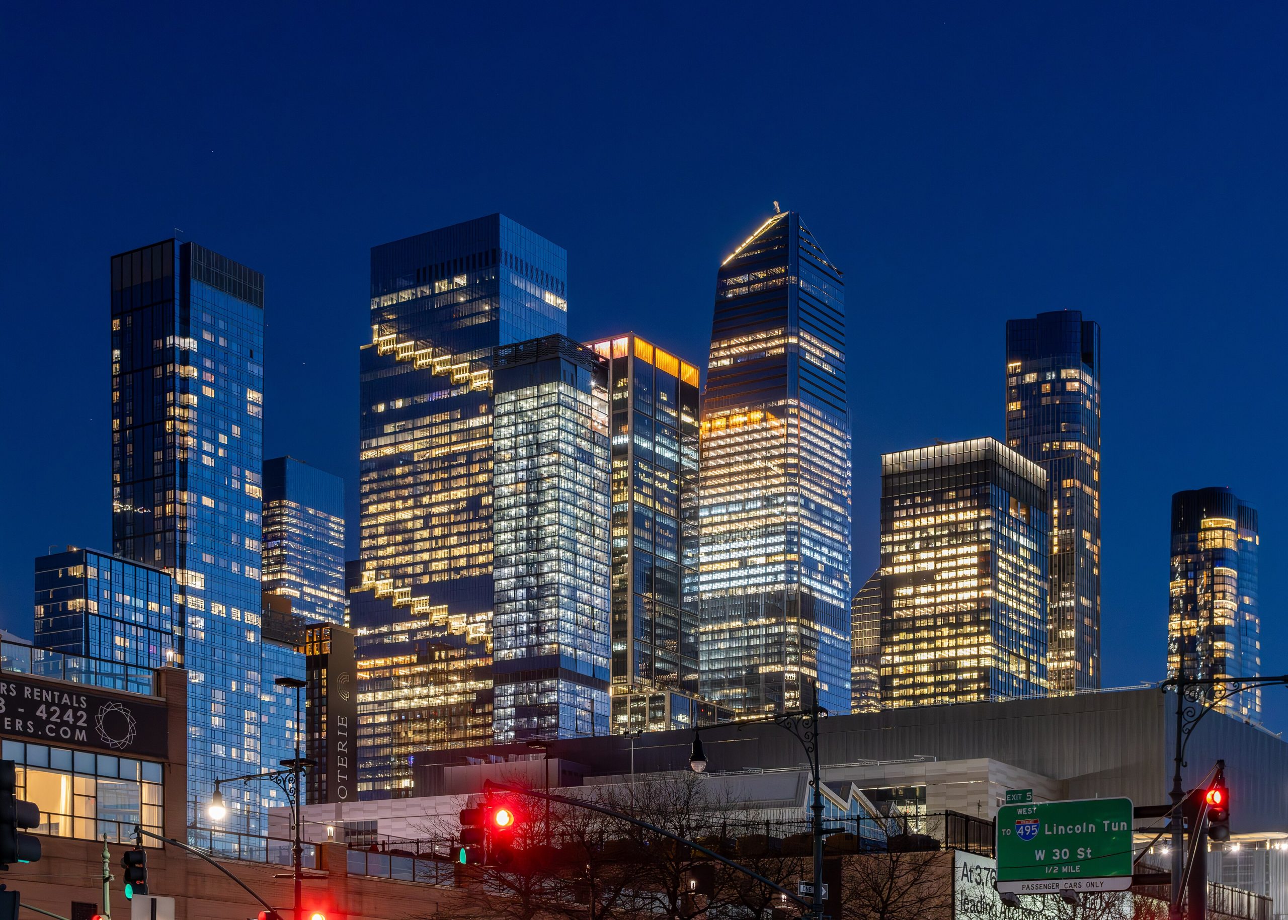 The Hudson Yards towers lit at night