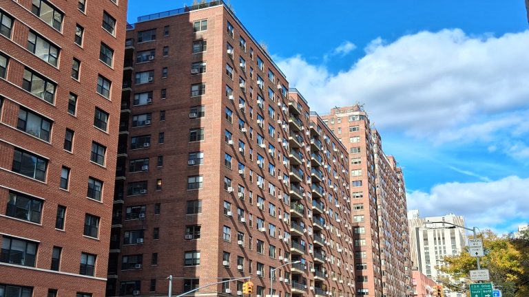Brick residential towers on the Upper East Side near the FDR Drive, November 2025